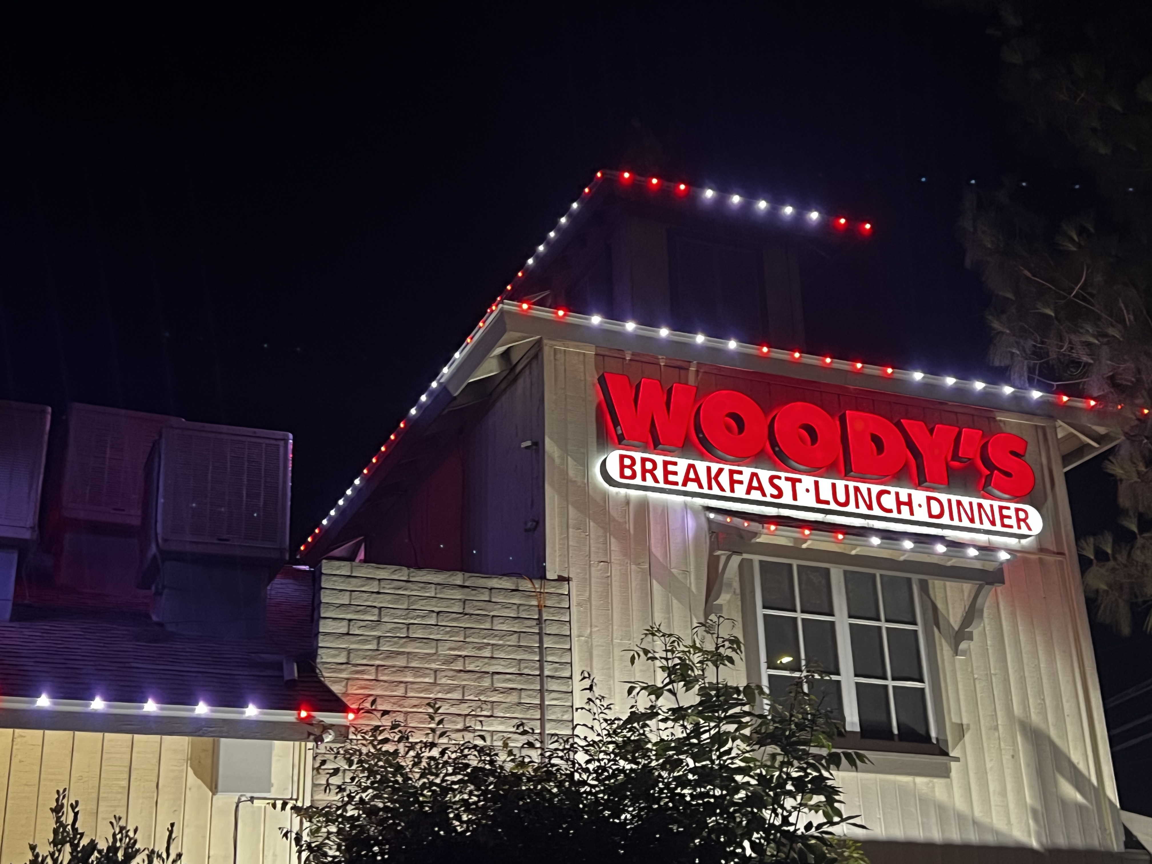 Woody's sign - red white